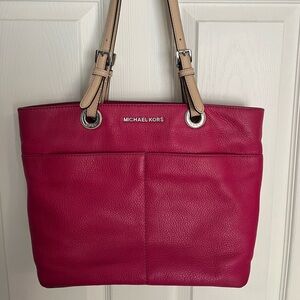 Michael Kors hot pink medium tote bag.